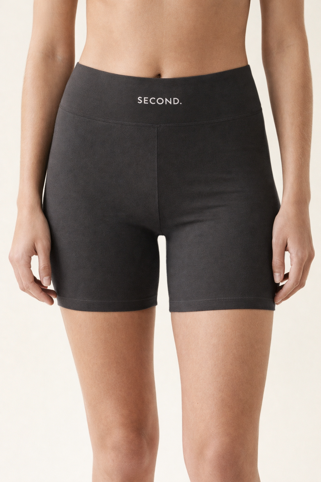 Close-up front view of SECOND. organic cotton bike shorts in white showing the high waistband