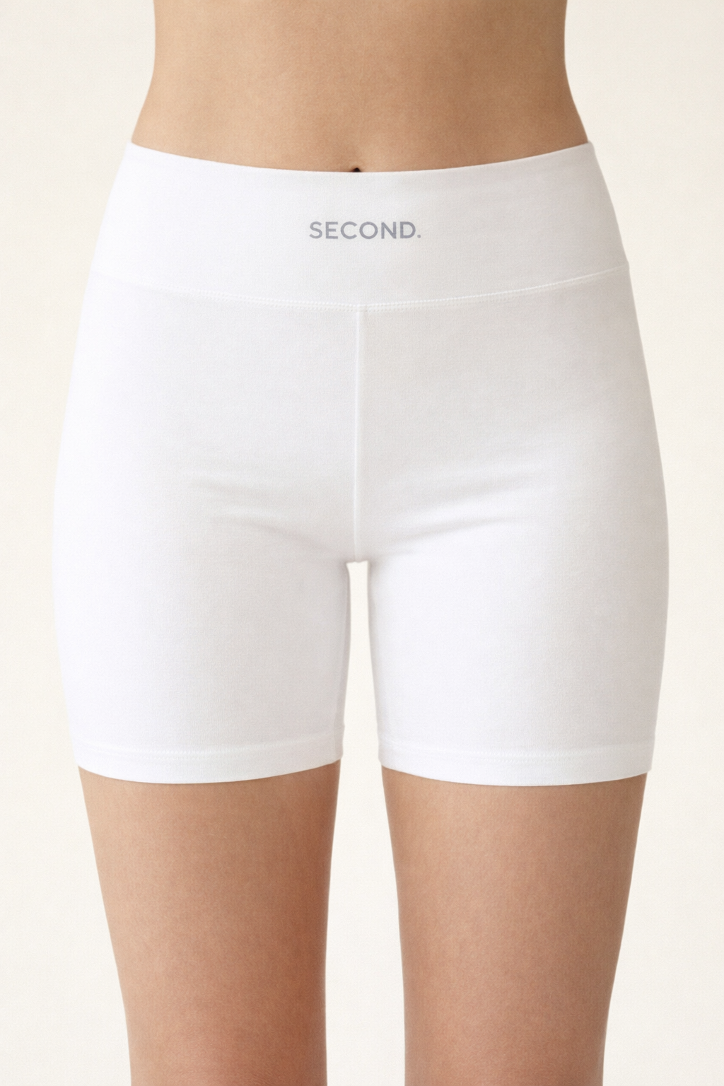 Close-up of SECOND. white organic cotton bike shorts showing the fabric weave